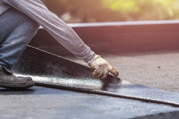 Professional Basement Waterproofing technician working in Maryville, TN